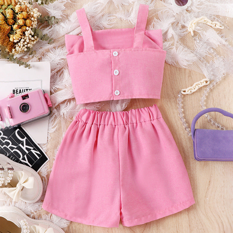 Solid color bow vest with hanging chain shorts two-piece set