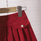 Two piece set of sleeveless vest and pleated skirt