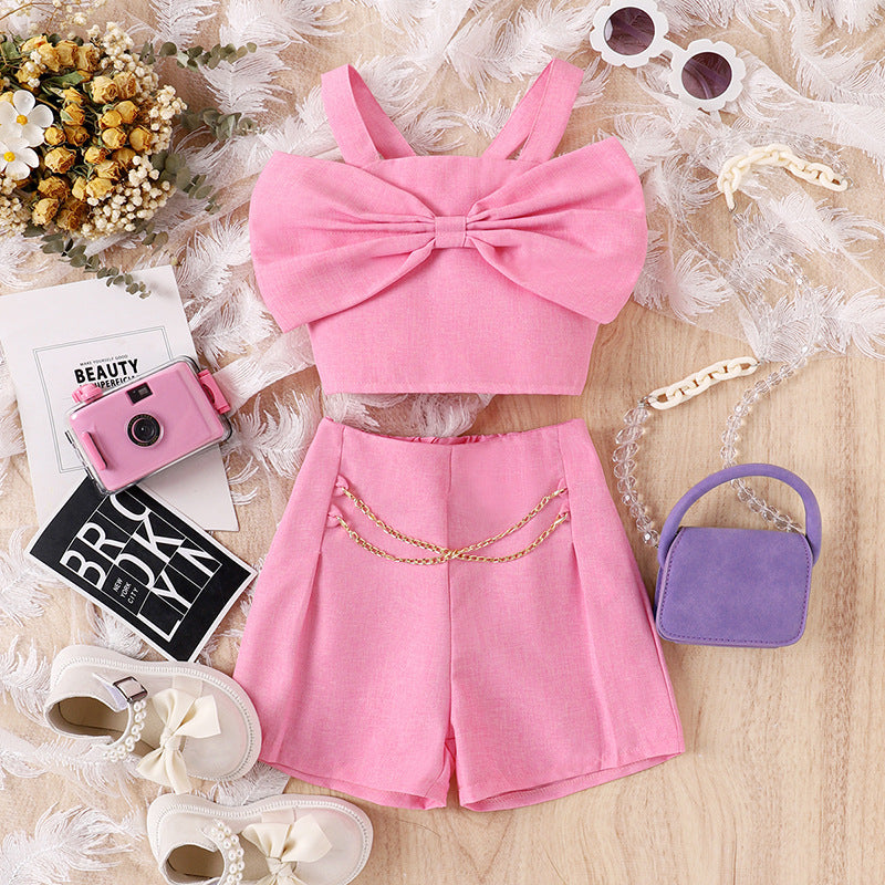 Solid color bow vest with hanging chain shorts two-piece set